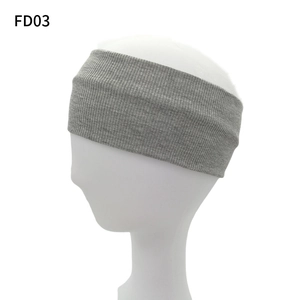 Elastic grey ribbed knit headband for sports and yoga, shown on a white model head