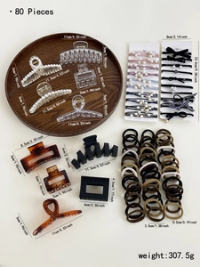 80-piece hair accessories set detail showing various claw clips and elastic scrunchies