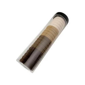 Close-up of seamless high elasticity hair ties in a gradient of earth tones and storage tube
