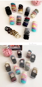 Elastic hair ties set in a transparent storage box with diverse colors and soft texture