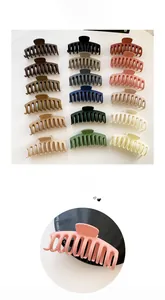 Macro view of 10.5cm matte hair claws in 15 vibrant colors with a sleek keel design