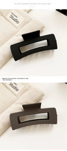 Detail of matte square hair claws in black and coffee with hollow rectangle design
