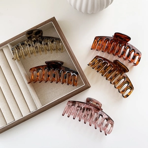 Set of large tortoiseshell acetate hair claws in amber and cream for thick hair styling