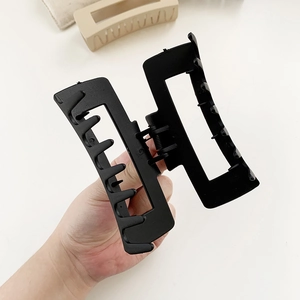 Elegant matte black square hair claw clip with strong grip for thick hair styling