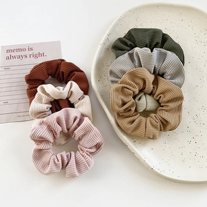 Set of pleated velvet scrunchies in Morandi colors with ribbed texture and elastic band