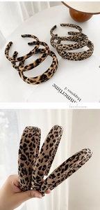 Detailed view of handmade leopard print headbands in various widths with fabric texture