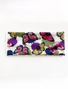 Close-up of bohemian yoga headband with colorful butterfly pattern on elastic cotton
