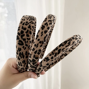 Set of three leopard print headbands in varying widths for a stylish vintage hair accessory