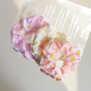 Set of 3 iridescent mesh scrunchies with daisy floral prints and satin texture