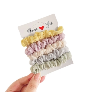 Set of 5 pastel chiffon hair scrunchies in macaron colors on a sweet display card