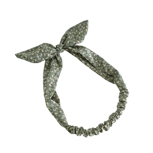 Bandeau élastique à fleurs marguerites vertes avec nœud oreilles de lapin pour femme