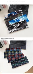 Détails de bandeaux de sport extensibles avec motifs camouflage et écossais