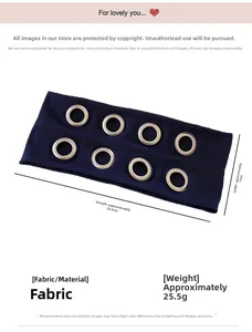 Close-up of navy blue printed headband with eight decorative silver metal eyelet buckles