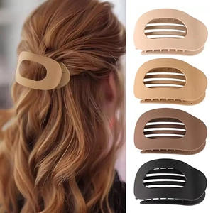 Set di 4 grandi mollette ovali opache per capelli in tonalità neutre beige, marrone e nero