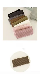 Detailed knit ribbed texture of elastic headbands in various Morandi solid colors