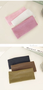 Detailed view of Morandi color knitted elastic headbands with vertical rib texture