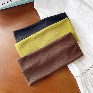 Lot de trois bandeaux de yoga en tricot côtelé en noir, jaune olive et marron foncé