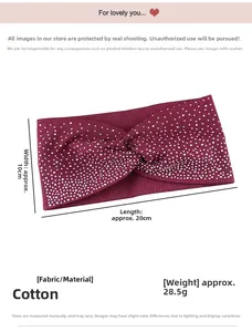 Macro shot of wine red knitted rhinestone headband detail with cotton texture and cross twist