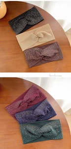 Detail of knitted knot headbands with sparkling rhinestones in various classic colors