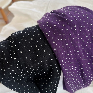 Chic knitted headband with sparkling rhinestones in deep black and purple shades