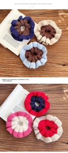 Detailed knit texture of contrast color scrunchies on a vintage wooden background