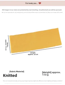 Detail view of mustard yellow ribbed knit headband showing stretch texture and 22cm length