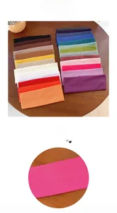 Detailed view of the ribbed knit texture and elasticity of various colorful yoga headbands