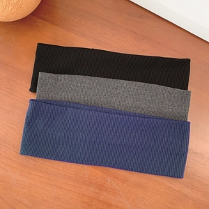 Three-pack elastic knitted ribbed headbands in black, grey and navy blue colors