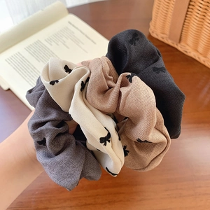 Set of four flocking bow print scrunchies in gray beige khaki and black colors