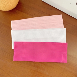 Three-pack elastic knitted wide headbands in light pink, white, and rose red for yoga
