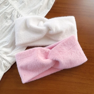 Plush faux fur cross headband in white and pink, warm winter elastic hair accessory