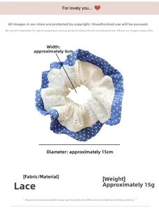 Detailed view of blue polka dot lace hair scrunchie with 15cm diameter size specifications