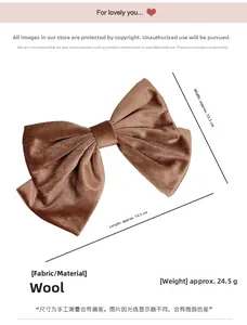 Detail view of brown velvet bow hair clip showing dimensions of 13.5cm by 19.5cm