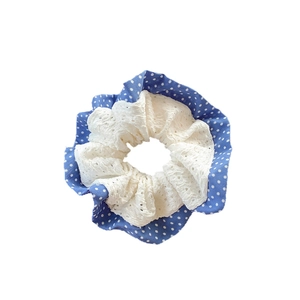 Charming blue polka dot lace scrunchie with layered white embroidery and elastic band