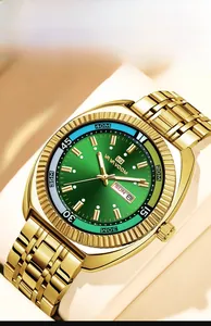 Detailed close-up of men's business watch with green dial and gold stainless steel strap