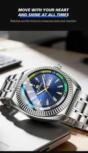 Detail of VAVAVOOM mens watch with blue sunray dial and steel strap on office desk
