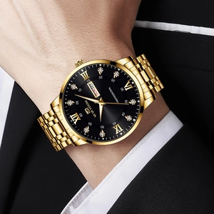 Luxury gold stainless steel men's watch with black dial and calendar on wrist