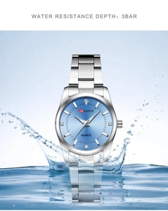 Waterproof lady watch with light blue dial and sparkling water splash effect