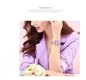 Detail of elegant women watch with pink gradient dial and silver magnetic buckle band