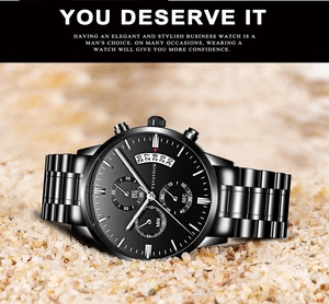 Close-up of VAVAVOOM mens black stainless steel watch with calendar and chronograph details