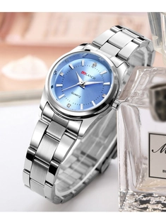 Detail of light blue sunray dial watch with crystal markers and silver steel strap