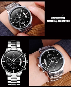 Detail view of silver stainless steel business watch with black dial and chronograph features
