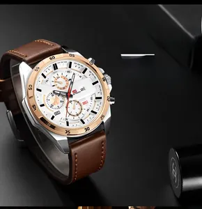 Detailed side view of men's watch with white multi-function dial and brown leather strap