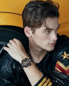 Fashionable men's chronograph watch with rose gold case on a stylish black leather strap