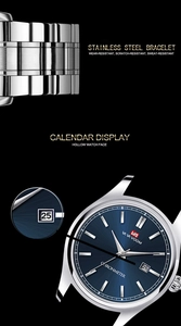 Vue macro du cadran bleu avec dateur et bracelet en acier inoxydable argenté poli