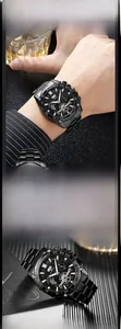 Close-up of black multifunctional men's chronograph watch with sleek metal band