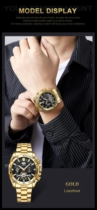 Detail of luxurious gold chronograph watch featuring black dial and steel chain strap