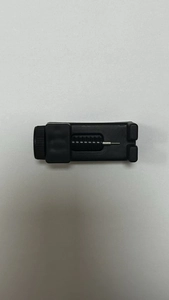 Detail view of the precision watch band adjuster tool with screw handle and metal pin