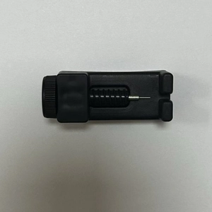 Black watch band link remover tool with adjustable knob and metal pin for watch repair