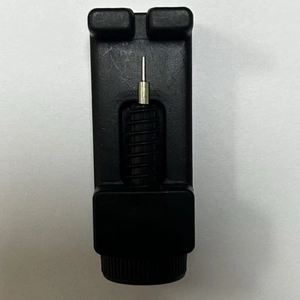 Precision watch band link remover tool made of black plastic with metal spring needle